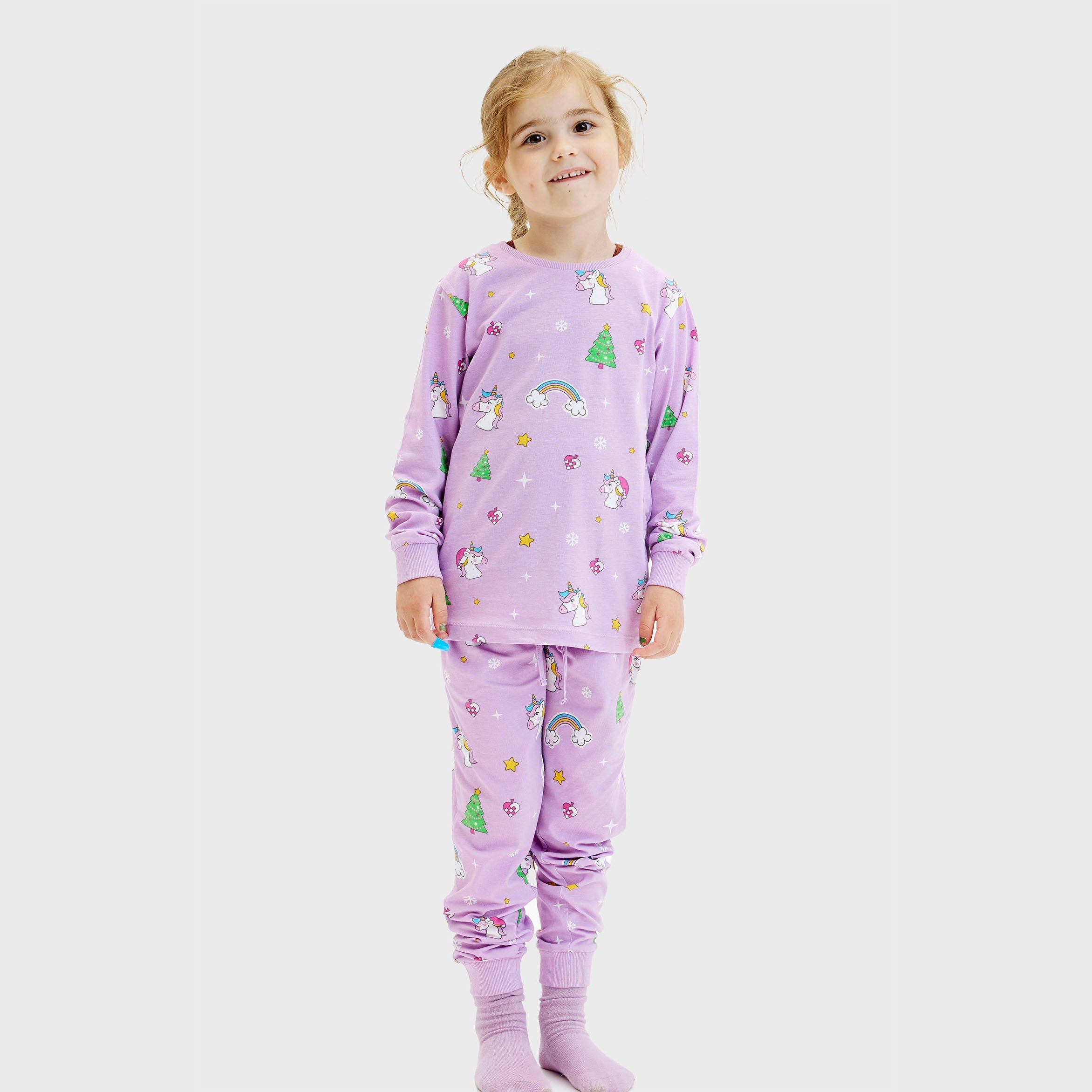 Lila Einhorn-Weihnachtspyjama mit bunten Weihnachtsmotiven für Kinder, weihnachtspyjama damen und herren geeignet.